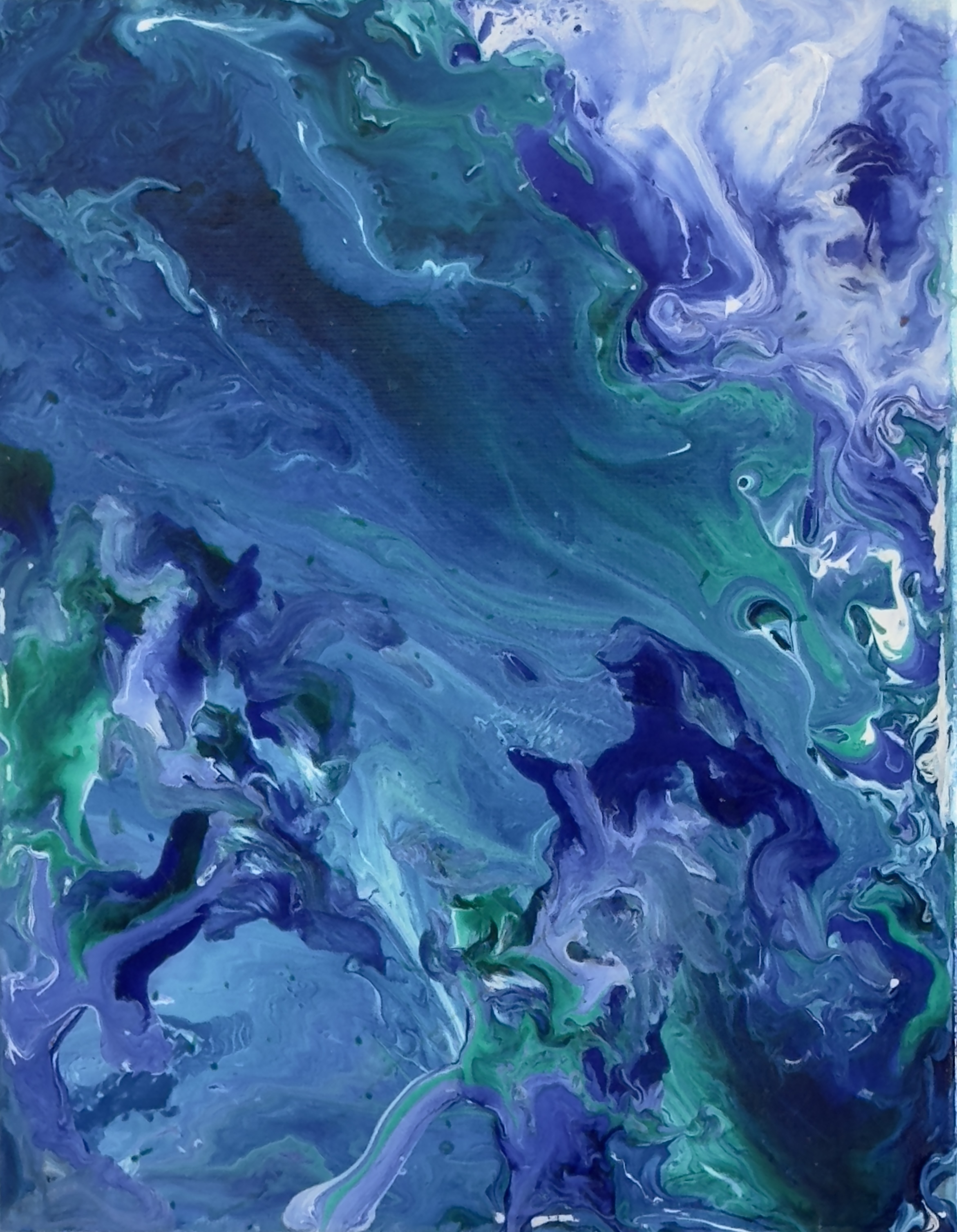 An abstract pouring painting of blues, greens and purples.